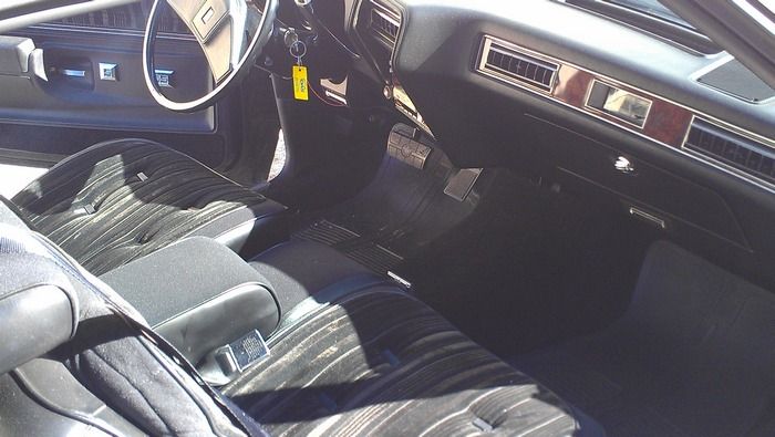 1977 Oldsmobile Cutass Supreme interior front seat and dash