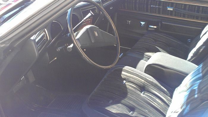 1977 Oldsmobile Cutass Supreme inside view of front seat