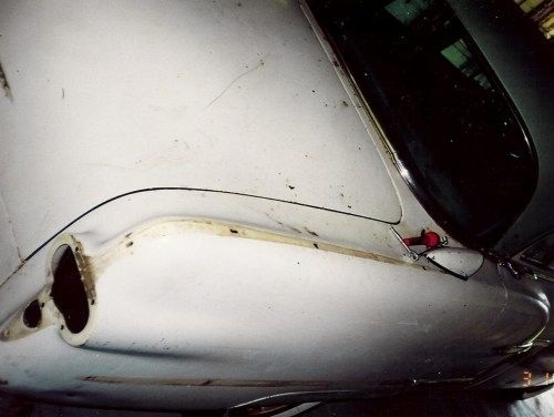 rear fender and trunk lid, 1954 Packard Patrician, shows original condition of the paint